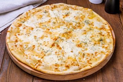 QUATRE FROMAGES